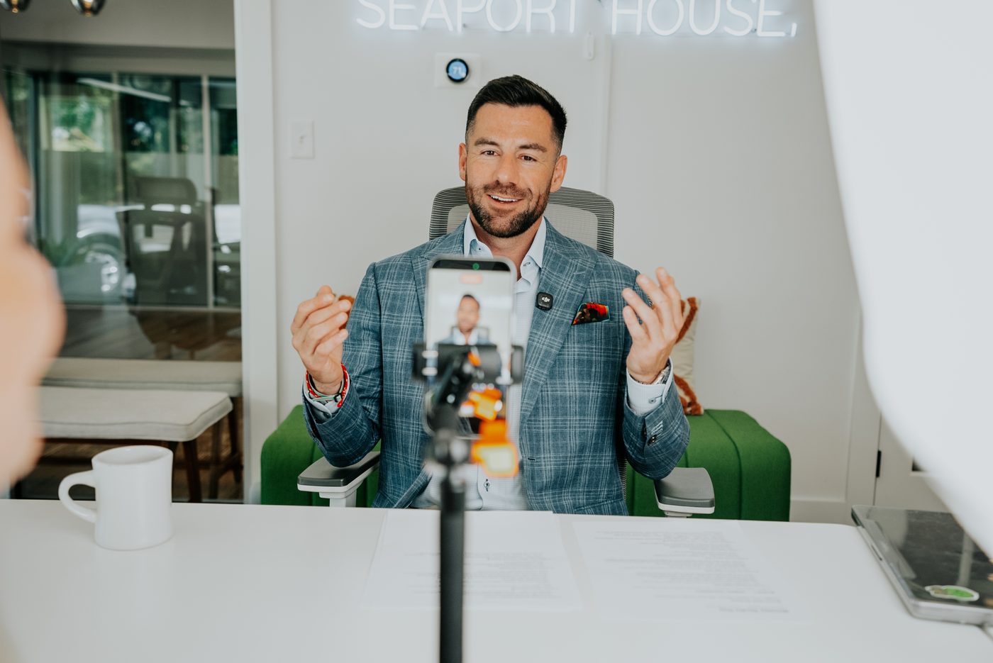 Chris Lawlor filming a video at the Seaport House office